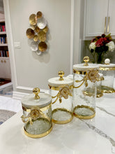Load image into Gallery viewer, Hammered Glass Canister With White Enamel and Gold Leaf Flower:
