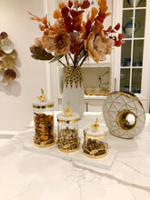 Load image into Gallery viewer, Glass and Gold Leaf Design Canister With Marble Lid