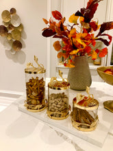 Load image into Gallery viewer, Glass and Gold Canister With Leaf Design